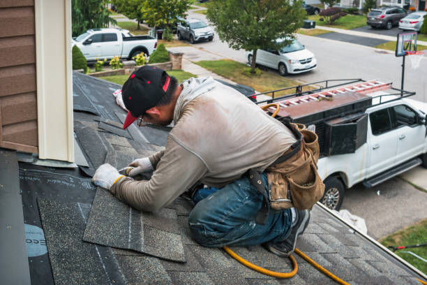 Professional Flat Roof Repair technician working in Pennellville, NY